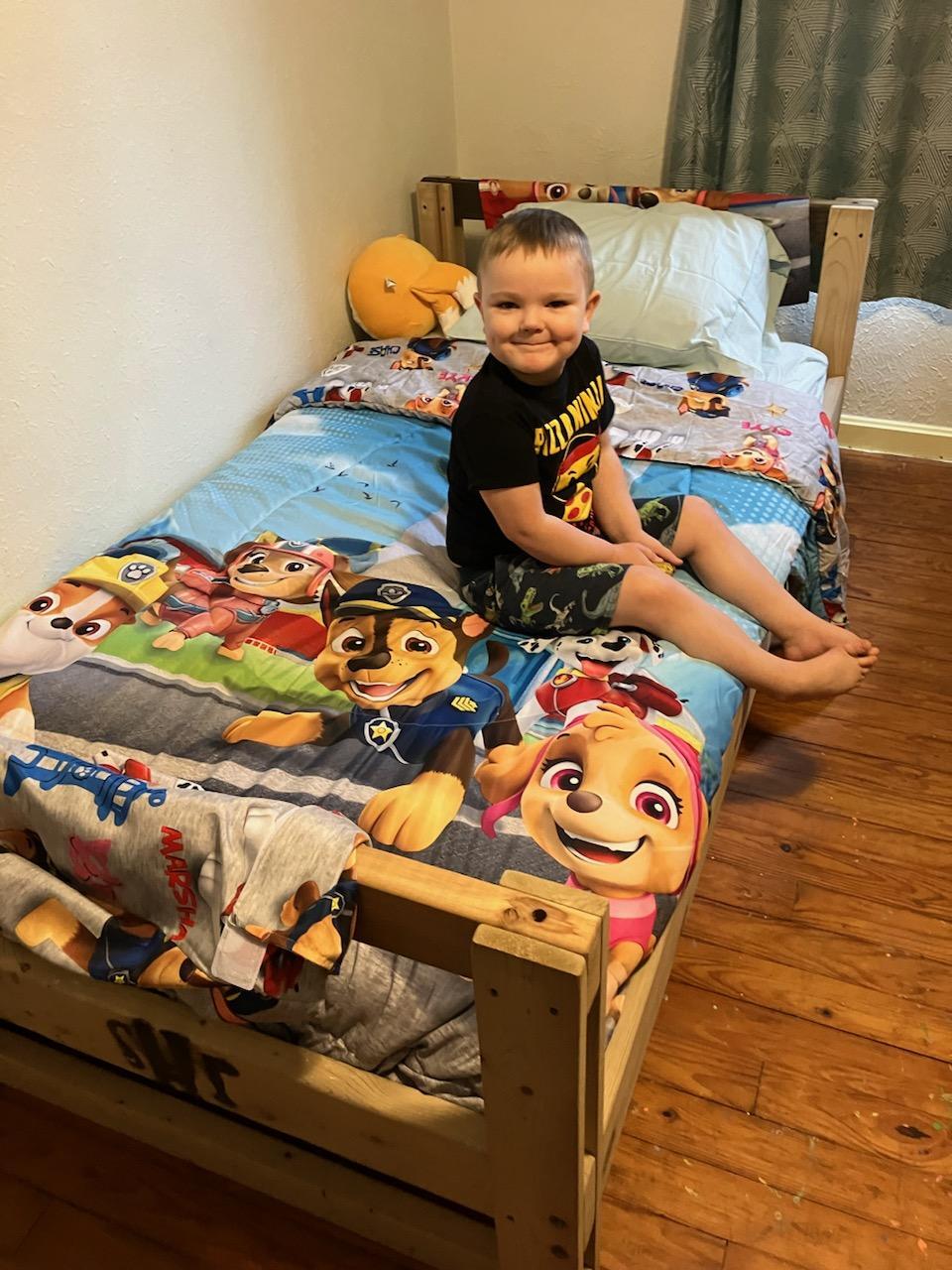 Completed bed setup with donated pillows for a Sleep In Heavenly Peace delivery