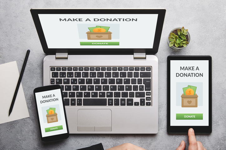 Person making a donation from a mobile device